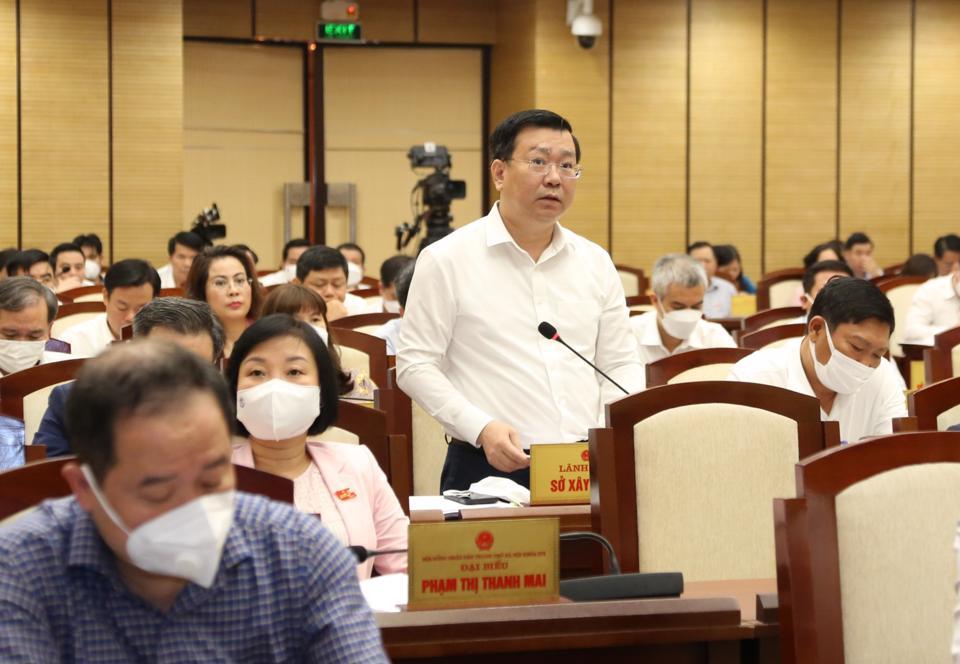 Giám đốc Sở Xây dựng TP Võ Nguyên Phong trả lời tại phiên giải trình