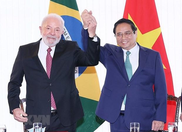 Thủ tướng Phạm Minh Chính với Tổng thống Brazil Lula da Silva. (Ảnh: Dương Giang/TTXVN)  