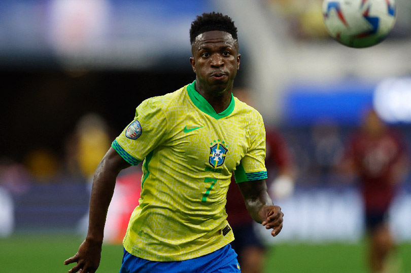 Ancelotti có mối quan hệ tốt với các ngôi sao như Vinicius. Ảnh: AFP