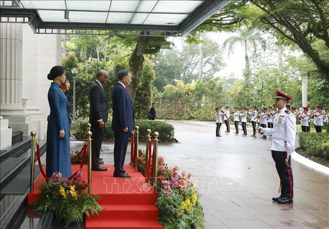 Lễ đón Tổng Bí thư, Chủ tịch nước Tô Lâm và Phu nhân được tổ chức trọng thể tại trụ sở Bộ Ngoại giao ở thủ đô Singapore. Ảnh: Thống Nhất/TTXVN